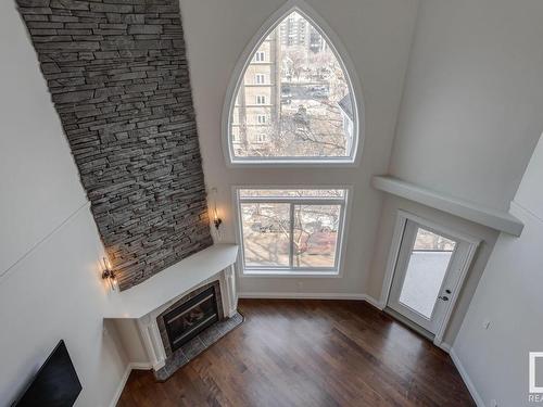 501 10178 117 Street, Edmonton, AB - Indoor Photo Showing Other Room With Fireplace