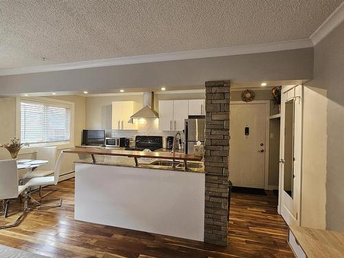 23 10525 83 Avenue, Edmonton, AB - Indoor Photo Showing Kitchen With Double Sink