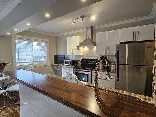 23 10525 83 Avenue, Edmonton, AB - Indoor Photo Showing Kitchen With Upgraded Kitchen