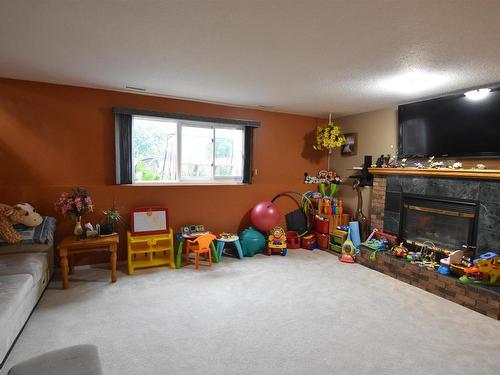 5410 52 Avenue, St. Paul Town, AB - Indoor Photo Showing Living Room With Fireplace