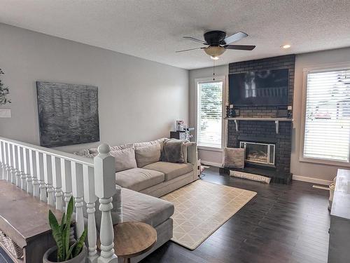 4209 48A Street, Vegreville, AB - Indoor Photo Showing Living Room With Fireplace