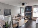 4209 48A Street, Vegreville, AB  - Indoor Photo Showing Living Room With Fireplace 