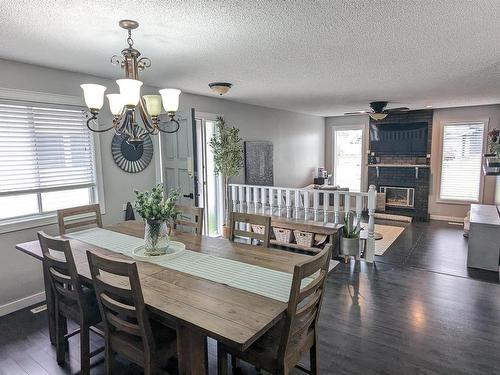 4209 48A Street, Vegreville, AB - Indoor Photo Showing Dining Room With Fireplace