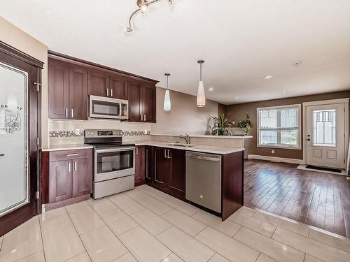 12722 127 Avenue Nw, Edmonton, AB - Indoor Photo Showing Kitchen With Double Sink