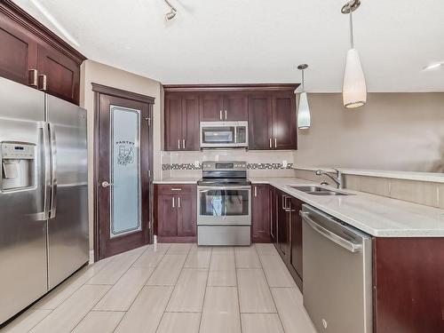 12722 127 Avenue Nw, Edmonton, AB - Indoor Photo Showing Kitchen With Double Sink