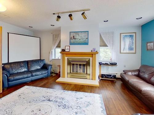 165016 Township Road 534, Rural Lamont County, AB - Indoor Photo Showing Living Room With Fireplace