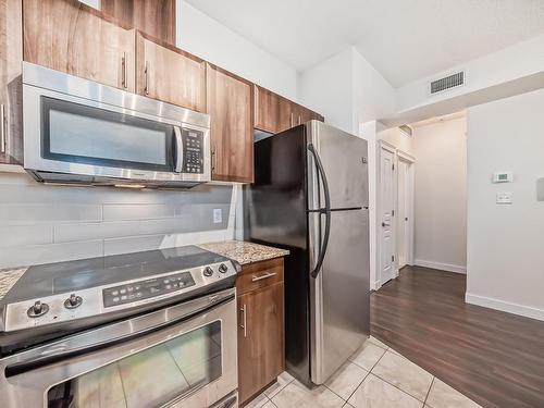 117 10333 112 Street, Edmonton, AB - Indoor Photo Showing Kitchen With Stainless Steel Kitchen