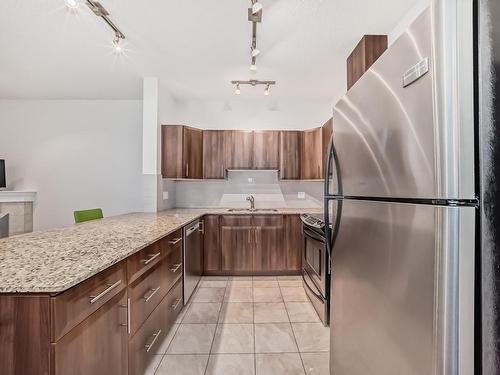 117 10333 112 Street, Edmonton, AB - Indoor Photo Showing Kitchen With Stainless Steel Kitchen