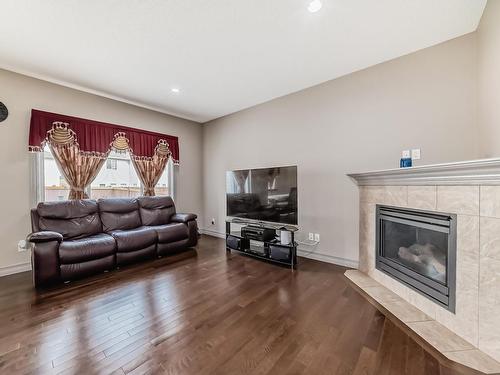 3342 18A Avenue, Edmonton, AB - Indoor Photo Showing Living Room With Fireplace