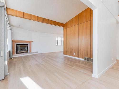 4828 122A Street, Edmonton, AB - Indoor Photo Showing Living Room With Fireplace