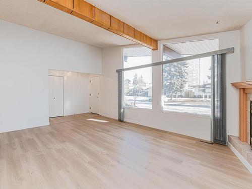 4828 122A Street, Edmonton, AB - Indoor Photo Showing Other Room With Fireplace