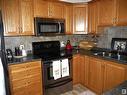 309 8931 156 Street Nw, Edmonton, AB  - Indoor Photo Showing Kitchen With Double Sink 