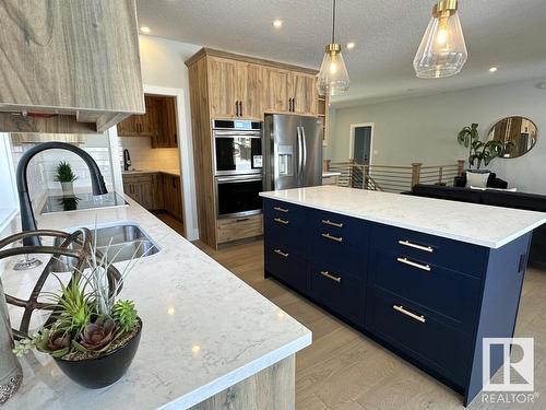 6 Hayfield Grove, Ardrossan, AB - Indoor Photo Showing Kitchen With Double Sink With Upgraded Kitchen