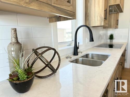 6 Hayfield Grove, Ardrossan, AB - Indoor Photo Showing Kitchen With Double Sink