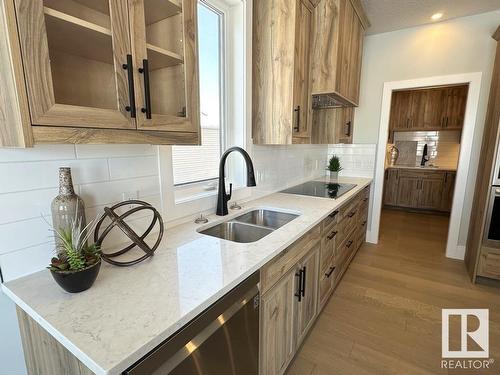 6 Hayfield Grove, Ardrossan, AB - Indoor Photo Showing Kitchen With Double Sink With Upgraded Kitchen