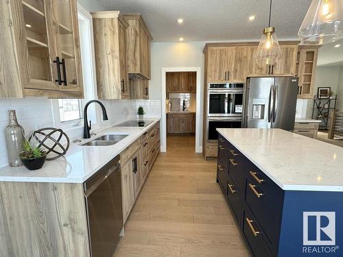 6 Hayfield Grove, Ardrossan, AB - Indoor Photo Showing Kitchen With Double Sink With Upgraded Kitchen