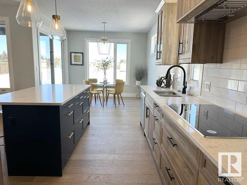 6 Hayfield Grove, Ardrossan, AB - Indoor Photo Showing Kitchen With Double Sink With Upgraded Kitchen