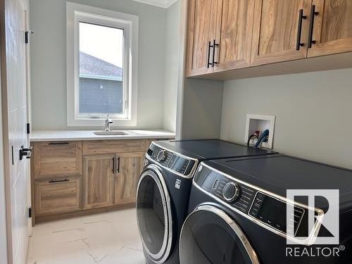 6 Hayfield Grove, Ardrossan, AB - Indoor Photo Showing Laundry Room