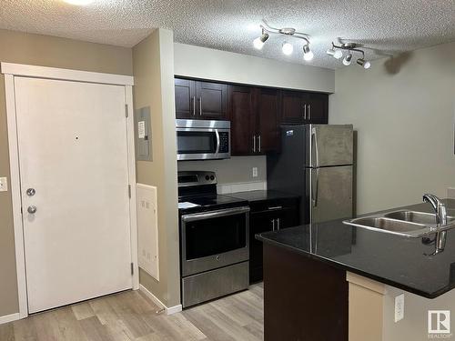 Edmonton, AB - Indoor Photo Showing Kitchen With Stainless Steel Kitchen With Double Sink