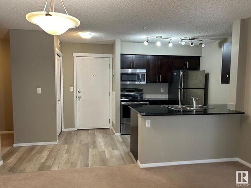 Edmonton, AB - Indoor Photo Showing Kitchen With Double Sink