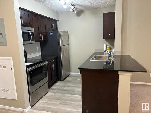 Edmonton, AB - Indoor Photo Showing Kitchen With Double Sink