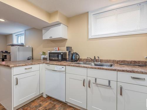 11322 51 Street, Edmonton, AB - Indoor Photo Showing Kitchen With Double Sink