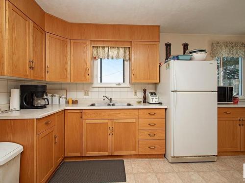 1, 24430 Twp Rd 552, Rural Sturgeon County, AB - Indoor Photo Showing Kitchen With Double Sink