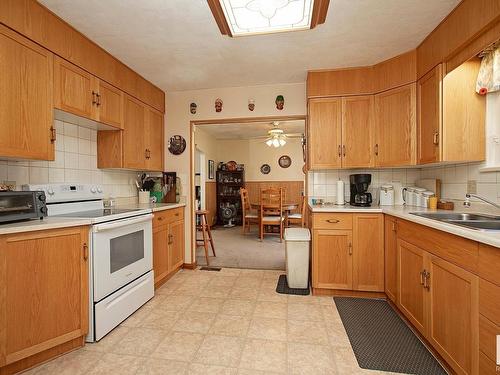 1, 24430 Twp Rd 552, Rural Sturgeon County, AB - Indoor Photo Showing Kitchen With Double Sink