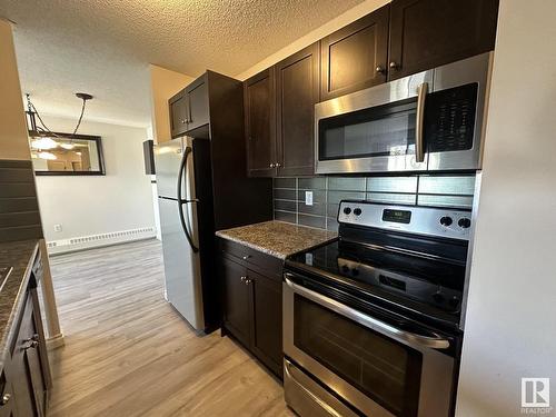 446 10636 120 Street, Edmonton, AB - Indoor Photo Showing Kitchen