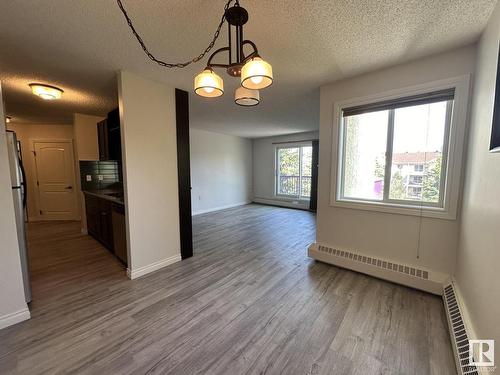 446 10636 120 Street, Edmonton, AB - Indoor Photo Showing Kitchen With Double Sink