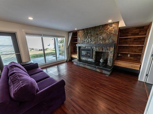 102 Parkins Avenue, Rural Lac Ste. Anne County, AB - Indoor Photo Showing Living Room With Fireplace