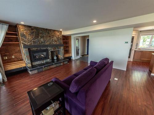 102 Parkins Avenue, Rural Lac Ste. Anne County, AB - Indoor Photo Showing Living Room With Fireplace