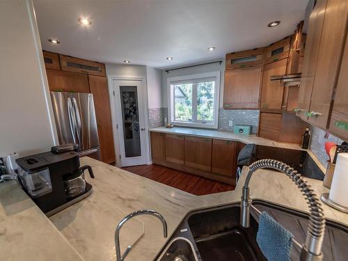 102 Parkins Avenue, Rural Lac Ste. Anne County, AB - Indoor Photo Showing Kitchen With Double Sink