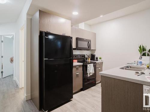 8720 150 Street, Edmonton, AB - Indoor Photo Showing Kitchen With Double Sink