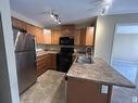 306 4903 47 Avenue, Stony Plain, AB  - Indoor Photo Showing Kitchen With Double Sink 