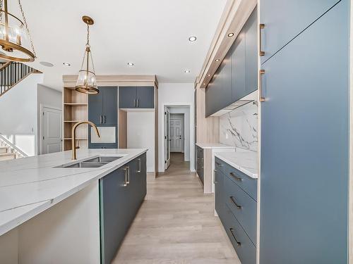 12 Meadowbrook Point(E), Spruce Grove, AB - Indoor Photo Showing Kitchen With Double Sink