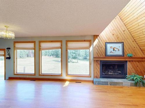 51 53026 Hghway 31, Rural Parkland County, AB - Indoor Photo Showing Living Room With Fireplace