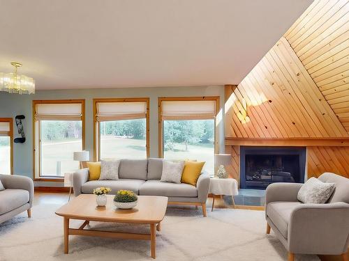 51 53026 Hghway 31, Rural Parkland County, AB - Indoor Photo Showing Living Room With Fireplace