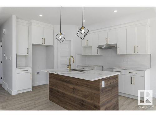 81 Silverstone Drive, Stony Plain, AB - Indoor Photo Showing Kitchen