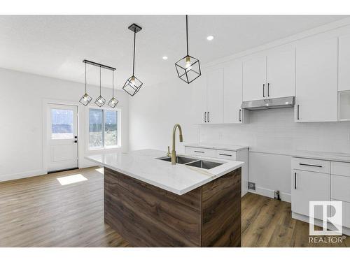 81 Silverstone Drive, Stony Plain, AB - Indoor Photo Showing Kitchen With Double Sink