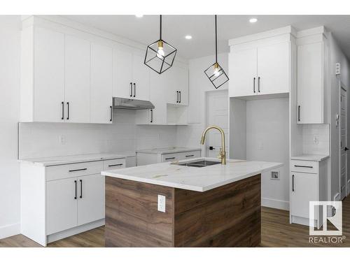 81 Silverstone Drive, Stony Plain, AB - Indoor Photo Showing Kitchen With Double Sink