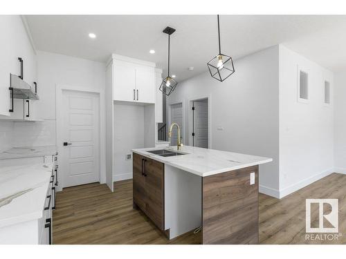 81 Silverstone Drive, Stony Plain, AB - Indoor Photo Showing Kitchen With Double Sink