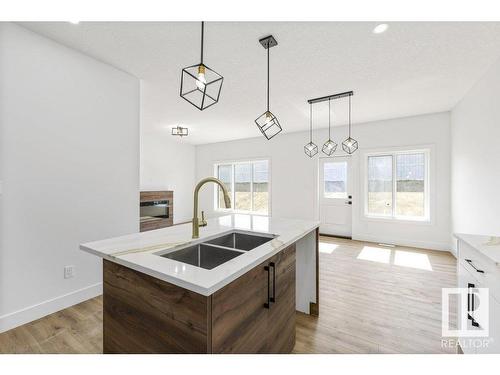 81 Silverstone Drive, Stony Plain, AB - Indoor Photo Showing Kitchen With Double Sink With Upgraded Kitchen