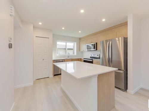 121 Stiles Link, Leduc, AB - Indoor Photo Showing Kitchen With Stainless Steel Kitchen With Upgraded Kitchen