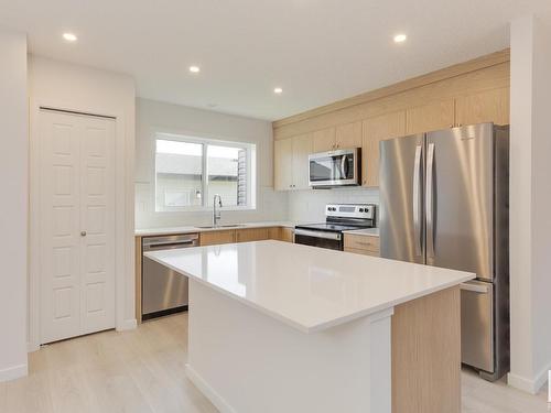 121 Stiles Link, Leduc, AB - Indoor Photo Showing Kitchen With Stainless Steel Kitchen