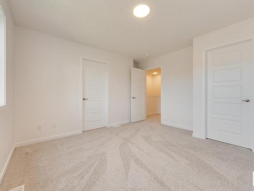 121 Stiles Link, Leduc, AB - Indoor Photo Showing Other Room