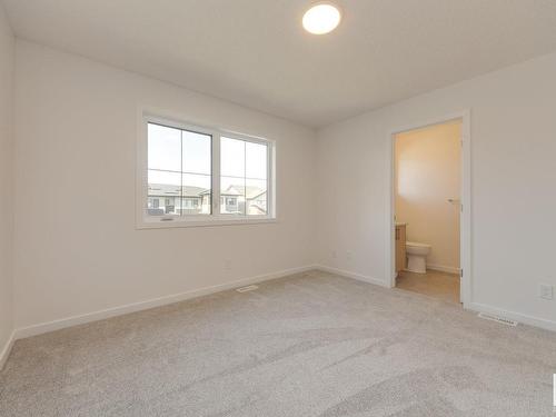 121 Stiles Link, Leduc, AB - Indoor Photo Showing Other Room