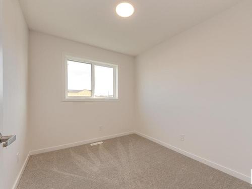 121 Stiles Link, Leduc, AB - Indoor Photo Showing Other Room