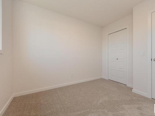 121 Stiles Link, Leduc, AB - Indoor Photo Showing Other Room