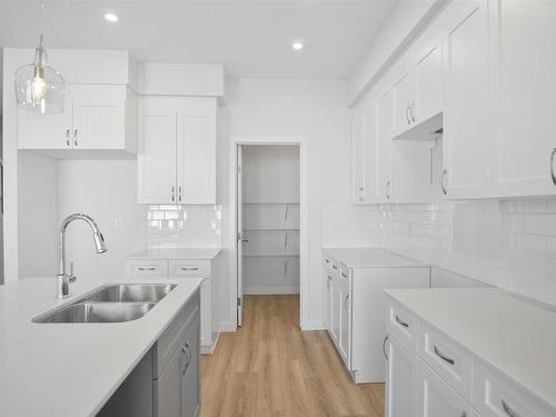 4682 177 Avenue, Edmonton, AB - Indoor Photo Showing Kitchen With Double Sink With Upgraded Kitchen